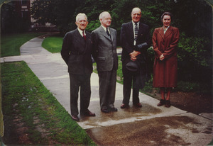 Four members of the class of 1905 standing outside