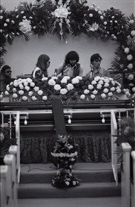 Duane Allman's funeral: Allman Brothers Band performing, from left, Jaimoe, Barry Oakley, Delaney Bramlett, and Dickey Betts, with Allman's casket in the foreground