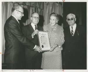 Dr. DiMichael and Jeremiah Milbank Jr. presenting Mary Switzer with the second annual George G. Deaver award