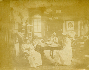 [Group of nurses in a living room]