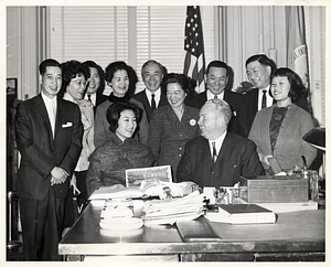 Mayor John F. Collins with unidentified group of men and women