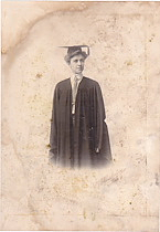 Young Woman in graduation cap and gown