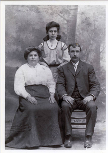 Mary Mello and her adoptive parents