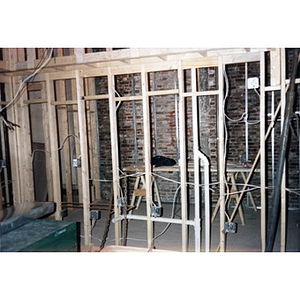 Interior framing and wiring during the renovation process at 326 Shawmut Avenue.