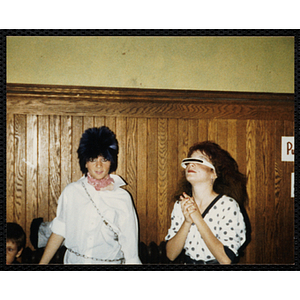 Two girls pose in their Halloween costumes