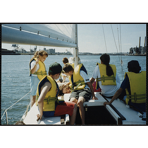 A group of children sail on Boston Harbor