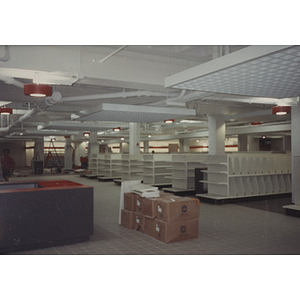 Workers setting up the student Bookstore in the Curry Student Center