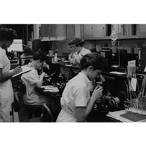 Female students working in medical lab