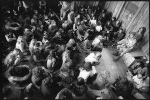 Michael Metelica addressing a crowd of commune members at a meeting inside the Brotherhood of the Spirit dormitory, Warwick, Mass. (view from above)