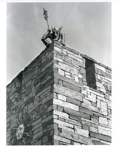 Devil atop roof of castle