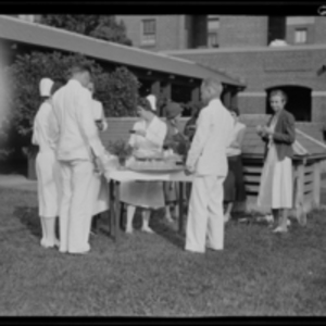 Party on the lawn during the Peter Bent Brigham Hospital nurse tennis tournament