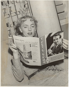 Christine Jorgensen Reading a Magazine and Smoking