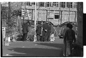 Men digging a hole in Downpatrick. The scene reminded Bobbie of the old joke, "How many Irish men does it take to dig a hole?  One to dig and six to look at him digging!"
