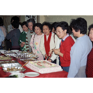 Cake-cutting at an International Women's Day event