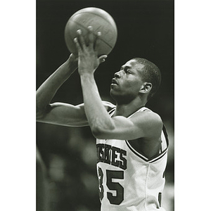 Reggie Lewis raised to shoot a foul shot during basketball game against BU