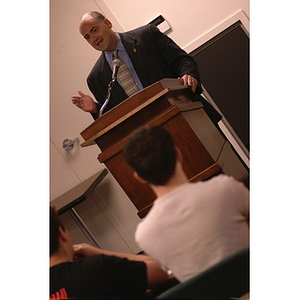 E. Edward Klotzbier at the podium during a Student Senate meeting