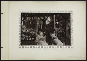 Two women reading on a porch, location unknown, undated