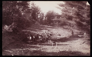 Workers lay out a road in Franklin Park, Roxbury, Mass.