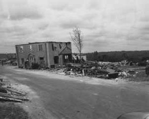 Damage and house on road from Worcester tornado