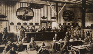 Interior view of a canteen showing soldiers and Red Cross workers
