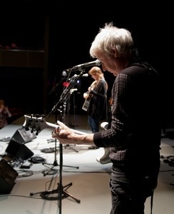 Gerry Leonard at soundcheck, Symphony Space, with Suzanne Vega in background