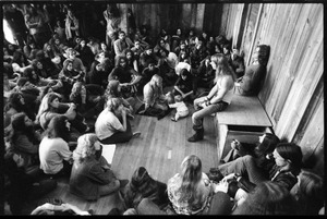 Michael Metelica addressing a crowd of commune members at a meeting inside the Brotherhood of the Spirit dormitory, Warwick, Mass. (view from above)