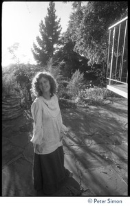 Usha (Cathy Brown): portrait on a flagstone patio