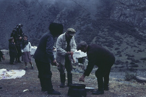 Men preparing to cook sheep on the Georgian Military Highway