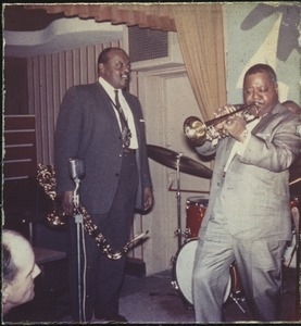 Ben Webster (with saxophone) performing with Emmett Berry (?) (trumpet) at the Jazz Workshop