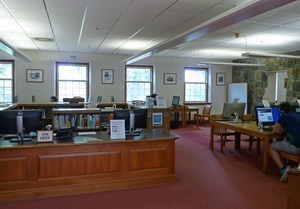 Jones Library: interior with reference desk and reading area