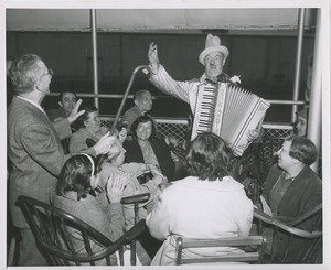 Accordionist playing music on ship