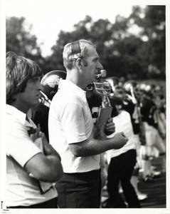 Coach Vandersea at a football game (c. 1976-1984)