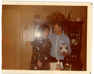 Leogilda and Manuel Espinola with soccer ball