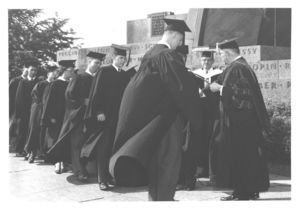 Students receiving their degrees at the 1962 Suffolk University commencement