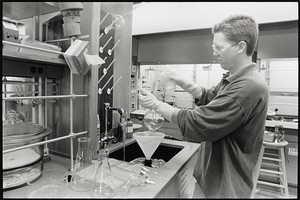 Jim Morken cleaning glassware in the new Chemistry Bldg