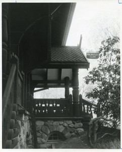 Philomatheia Hall exterior: front porch and Philomatheia Club sign