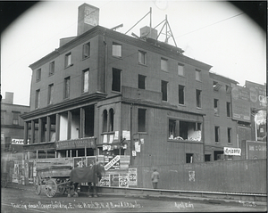 Tearing down Prager building on east side of Washington Street North and Boston & Albany Railroad tracks