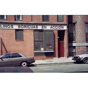 A close-up view of the side of Inquilinos Boricuas en Acción's headquarters building at 405 Shawmut Ave.