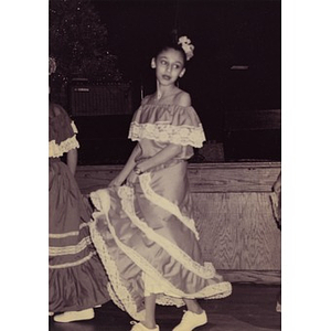 Girl in traditional dance costume at the Jorge Hernandez Cultural Center.