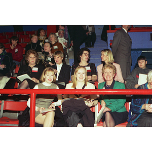 Three women in the audience at the inauguration of President Freeland