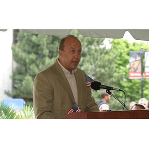 Unidentified man speaks from the podium at the Veterans Memorial groundbreaking ceremony