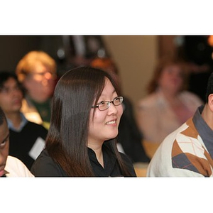 Qinrui Pang in the audience at a Torch Scholars event