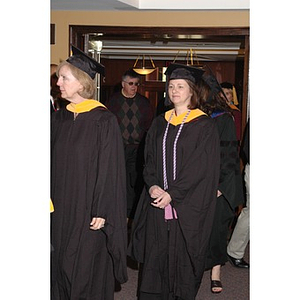 Faculty members proceed into School of Nursing convocation