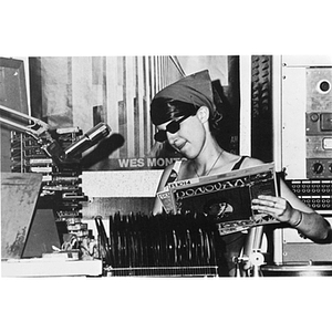 Donna Halper playing records for WNEU broadcast