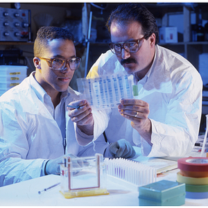 Engineering co-op, Shaun Meyer, and supervisor Charles Vecoli, in a laboratory at Integrated Separation Systems