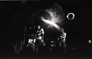 Hot Tuna concert: Band in performance on stage: Jorma Kaukonen (guitar) and Jack Casady (bass) in front of light show