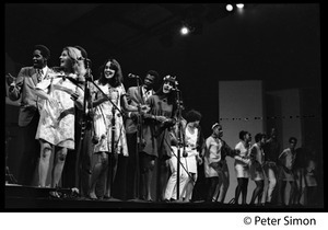 Judy Collins, Joan Baez, Mimi Farina (l. to r.) and the Chambers Brothers (rear) at the Newport Folk Festival