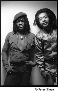 Sly Dunbar (let) and unidentified man: double portrait back stage before appearance with Peter Tosh on Saturday Night Live