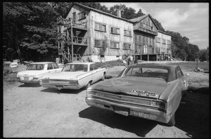 View over parked cars of the Warwick dormitory, Brotherhood of the Spirit commune