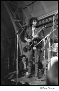 Jerry Garcia (Grateful Dead), performing on guitar in concert at MIT during the student strike against the war in Vietnam and killings at Kent State